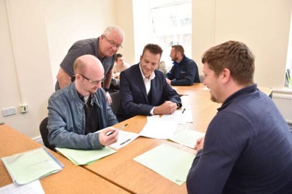 Participant receiving coaching 600x399