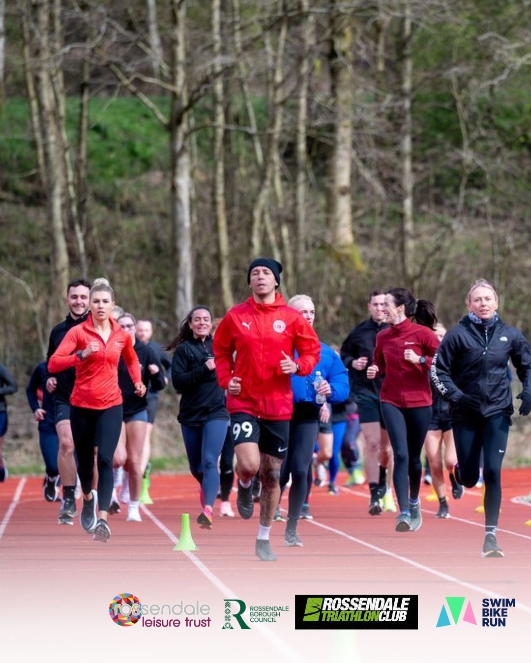 Group of people running as part of a triathlon